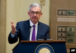 FILE - Federal Reserve Chairman Jerome Powell addresses the Federal Reserve Board's 15th annual College Fed Challenge Finals in Washington, Nov. 29, 2018.