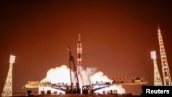 The Soyuz TMA-13M spacecraft carrying the International Space Station crew of Alexander Gerst of Germany, Maxim Suraev of Russia and Reid Wiseman of the U.S. lifts off from the launch pad at the Baikonur cosmodrome May 29, 2014. REUTERS/Shamil Zhumatov