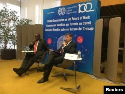 South African President Cyril Ramaphosa and International Labour Organization Director-General Guy Ryder launch the report of the Global Commission on the Future of Work at a news conference held at ILO headquarters in Geneva, Jan. 22, 2019.