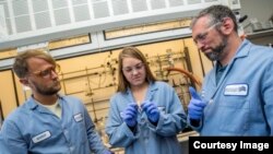 Members of the scientific research team at the Department of Energy’s Lawrence Berkeley National Laboratory included (left to right) Peter Christensen, Kathryn Loeffler and Brett Helms. (Credit: Marilyn Chung/Berkeley Lab)