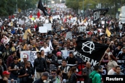Demonstrators take part on a protest against a fuel price hike in Mexico City, Mexico, Jan. 9, 2017.
