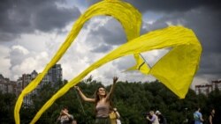 A participant flies a kite during the 'Letatlin N4' annual Festival of Kites, in Moscow, Russia, June 6, 2021.