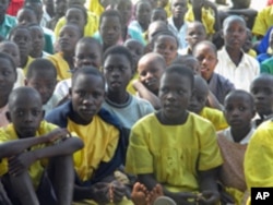 Diane Kroska shared stories about Minnesota winters with children at Nagabita Primary School in Uganda.