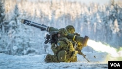 ესტონელი ჯარისკაცები "ჯაველინით"