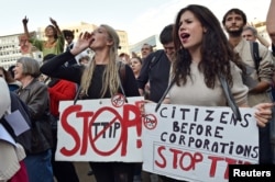 Thousands of people demonstrate against the Transatlantic Trade and Investment Partnership (TTIP) and the EU-Canada Comprehensive Economic and Trade Agreement (CETA) in the center of Brussels, Belgium, Sept. 20, 2016.