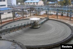 FILE - A view of a refined-copper mine of Jiangxi Copper Company in Dexing, Jiangxi province, China..
