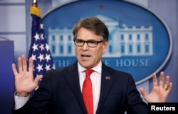 FILE - U.S. Energy Secretary Rick Perry speaks to reporters during a briefing at the White House in Washington.
