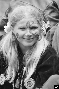 This woman sitting at a park in California in 1967 could be called a free spirit. (AP Photo)
