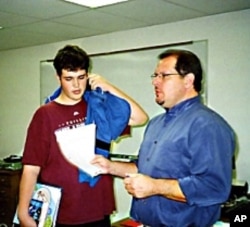 For his 9th grade same-sex English class, teacher Michael Bair selects reading material that deals with the male experience.