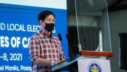 FILE - Philippine Senator Panfilo Lacson delivers a message after filing his certificate of candidacy for president in the 2022 national election, in Pasay City, Metro Manila, Philippines, Oct. 6, 2021.