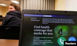 FILE - A health care enrollment fair, co-sponsored by Planned Parenthood of Northern New England, is held in Portsmouth, New Hampshire, Nov. 9, 2013.