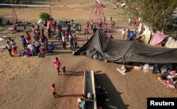 Central American migrants participating in a caravan heading to the U.S. take a pause from the journey in Matias Romero, Oaxaca, Mexico, April 2, 2018.