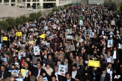 Iranian worshippers chant slogans during a rally against anti-government protestors after the Friday prayer ceremony in Tehran, Iran, Jan. 5, 2018.