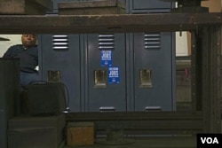 Worker Hector Carmona takes a lunch break at Marlin Steel in Baltimore, Maryland. (V. Macchi/VOA)