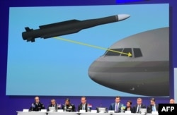Members of a joint investigation team present the preliminary results of the criminal investigation into the downing of MH17, Nieuwegein, September 28, 2016.