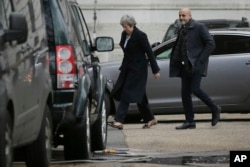 British Prime Minister Theresa May arrives at 10 Downing Street in London, Dec. 10, 2018.