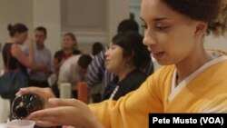 Jasmine Taylor pouring sake at the Grand Sake Tasting in Washington, DC