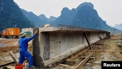 Infrastructure projects are underway throughout Vietnam. This earlier highway bridge project was in Quang Binh province.