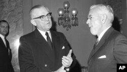 Sen. John Stennis, left, is seen with then CIA director John McCone before the start of a session of the Senate Armed Services Subcommittee, on Capitol Hill in Washington, Feb. 7, 1963.