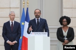 French Culture Minister Franck Riester, French PM Edouard Philippe and French Junior Minister and Government's spokesperson Sibeth Ndiaye attend a news conference after the weekly Cabinet meeting, Apr. 17, 2019.