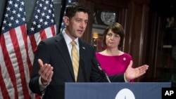 House Speaker Paul Ryan of Wisconsin, accompanied by Rep. Cathy McMorris Rodgers, R-Wash., takes questions from reporters at Republican National Committee Headquarters in Washington, May 17, 2017.