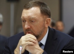FILE - Oleg Deripaska attends an agreement signing ceremony with the Krasnoyarsk region's government in Moscow, Russia, Dec. 12, 2017.