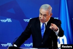 FILE - Israel's Prime Minister Benjamin Netanyahu gestures as he speaks during a news conference in Jerusalem, April 1, 2019.