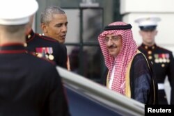 FILE - U.S. President Barack Obama greets Saudi Arabia's Crown Prince Mohammed bin Nayef as he plays host to leaders and delegations from the Gulf Cooperation Council countries at the White House in Washington, May 13, 2015.
