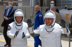 អវកាសយានិករបស់អង្គការ NASA គឺលោក Douglas Hurley និងលោក Robert Behnken ឡើងជិះរ៉ុក្កែត SpaceX Falcon 9 ក្នុងអំឡុងពេលបេសកកម្មអវកាស SpaceX Demo-2 របស់អង្គការ NASA ទៅកាន់ស្ថានីយ៍អវកាសអន្តរជាតិពីមជ្ឈមណ្ឌលអវកាស Kennedy ក្នុង​ទីក្រុង Cape Canaveral រដ្ឋ Florida នៅថ្ងៃសៅរ៍ទី ៣០ ខែឧសភាឆ្នាំ ២០២០។ (AFP)