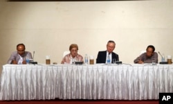 Members of the Independent Commission of Enquiry for Rakhine State — from left, former Chair of the Constitutional Tribunal of Myanmar Mya Thein, Philippine diplomat Rosario Manalo, former Japanese Ambassador to the U.N. Kenzo Oshima and former senior official of UNICEF Aung Tun Thet — attend a press briefing at a hotel in Naypyitaw, Myanmar, Aug. 16, 2018.