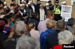 People gather during a vigil for Labour Member of Parliament Jo Cox, in Batley near Leeds, in Britain, June 17, 2016.