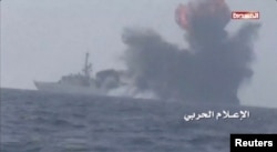 FILE - An explosion is seen onboard what is believed to be a Saudi warship, off the western coast of Yemen in this still frame taken from video posted by Houthi-run al-Masirah television on their social media website, and obtained by Reuters, Jan. 31, 2017.