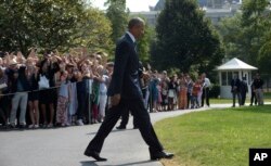 President Barack Obama walks towards Marine One on the South Lawn of the White House in Washington, Wednesday, Aug. 31, 2016. Obama is leaving for his last trip to Asia as U.S. president, with stops in China and Laos. (AP Photo/Susan Walsh)