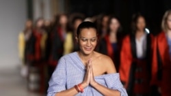 Designer Stella Jean at the end of her women's fashion collection show, presented in Milan, Italy, Sunday, September 24, 2017. (AP Photo/Luca Bruno)