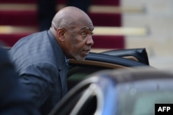 FILE - Mali's then-prime minister, Cheikh Modibo Diarra, arrives at the French foreign ministry prior to a meeting with French officials, Sept. 20, 2012, in Paris.