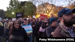 Protesters urging the White House not to impede Robert Mueller's probe into Russian meddling gathered outside the White House and in Lafayette Park, just north of the White House, in Washington, Nov. 8, 2018.