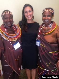 Pearl Gottschalk (C) of Lush Cosmetics, an eco-friendly corporate funder, poses with two women from Kenya's Kivulini Trust, at the World Summit on Indigenous Philanthropy in New York Sept. 26, 2014. (Courtesy - Pearl Gottschalk)