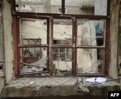 Xitoy Suriya ahlini tinchlikka undamoqda, Damashqda fuqarolar o'qqa olingan