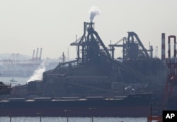 FILE- The factory of JFE Steel Corp. is seen in Kawasaki, near Tokyo, March 2, 2018.