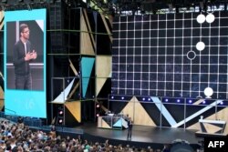 FILE - Google chief executive Sundar Pichai outlines a future rich with artificial intelligence at the Internet firm's annual developers gathering in the Silicon Valley city of Mountain View, Calif., May 18, 2016.