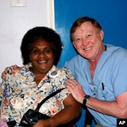 Dr. Jerry Beeve with an eye patient in Fuji