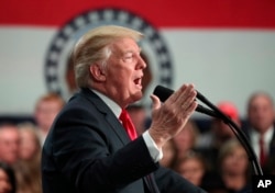 FILE - President Donald Trump speaks about tax reform at the St. Charles Convention Center, Wednesday, Nov. 29, 2017, in St. Charles, Mo.