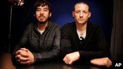 FILE - Recording artists Mike Shinoda, left, and Chester Bennington pose for a portrait, Sept. 16, 2010 in New York.