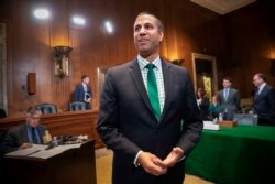 FCC Chairman Ajit Pai prepares to testify about his budget before a Senate Appropriations subcommittee on Capitol Hill in Washington, May 17, 2018.