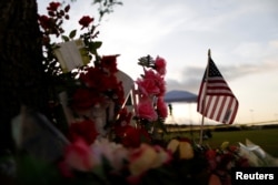 A makeshift memorial in memory of the victims killed Friday in a shooting at Santa Fe High School is seen in Santa Fe, Texas, May 20, 2018.