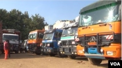 FILE - Trucks carrying goods for Central African Republic are blocked across the border in Garoua Boulay, Cameroon, because of a rebel protest in CAR, March 19, 2019. (M.E. Kindzeka/VOA)