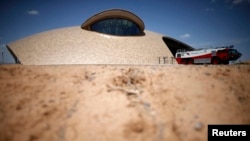 A firetruck is parked outside Spaceport Operations Center at Spaceport America near Truth or Consequences, New Mexico, May 1, 2014.