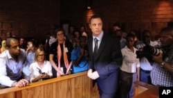 Olympic athlete, Oscar Pistorius , in court Friday Feb. 22, 2013 in Pretoria, South Africa, for his bail hearing charged with the shooting death of his girlfriend, Reeva Steenkamp.