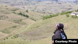 Many South Africans, like Nongezi Sinkile, must walk very far across treacherous terrain to access healthcare (Photo:D.Taylor)