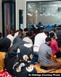 Attendees at the first Black Iftar event, held in Chicago, breaking for prayer.